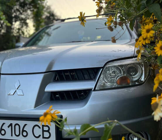 Серый Мицубиси Аутлендер, объемом двигателя 2.38 л и пробегом 238 тыс. км за 7450 $, фото 53 на Automoto.ua