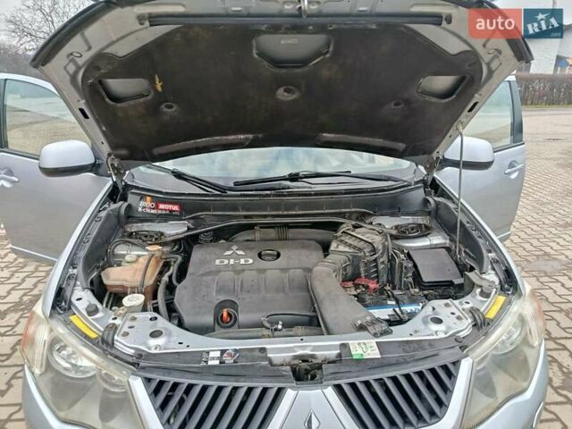 Серый Мицубиси Аутлендер, объемом двигателя 2 л и пробегом 332 тыс. км за 7650 $, фото 29 на Automoto.ua