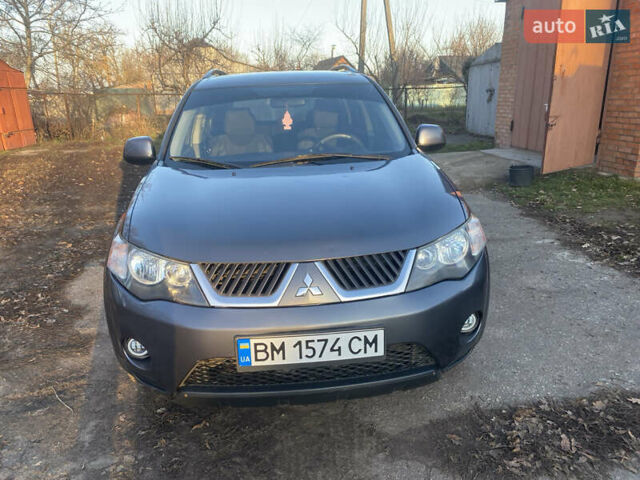 Серый Мицубиси Аутлендер, объемом двигателя 1.97 л и пробегом 257 тыс. км за 9000 $, фото 4 на Automoto.ua