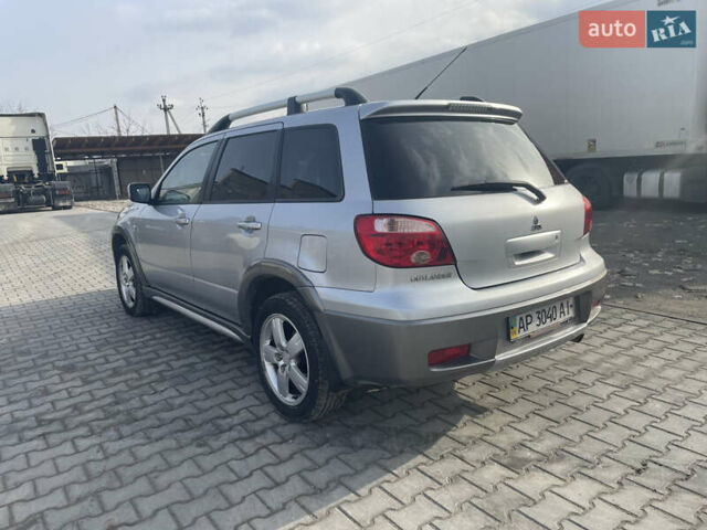 Сірий Міцубісі Аутлендер, об'ємом двигуна 2.4 л та пробігом 166 тис. км за 6700 $, фото 3 на Automoto.ua