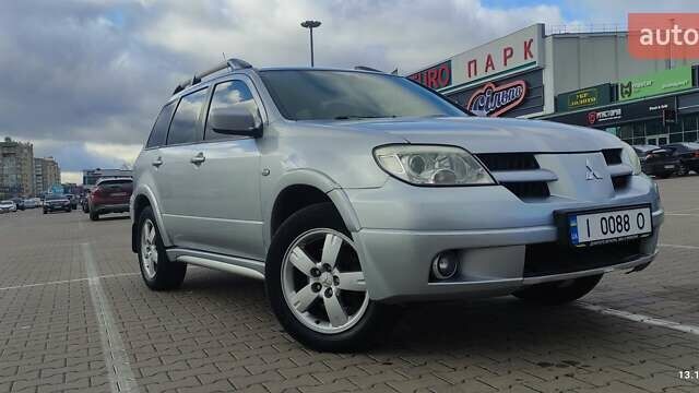 Сірий Міцубісі Аутлендер, об'ємом двигуна 2.4 л та пробігом 170 тис. км за 6400 $, фото 9 на Automoto.ua