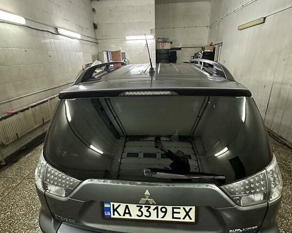 Сірий Міцубісі Аутлендер, об'ємом двигуна 2.36 л та пробігом 190 тис. км за 7700 $, фото 1 на Automoto.ua