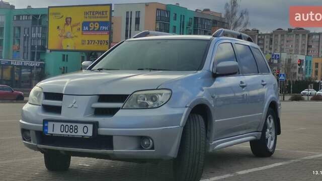 Сірий Міцубісі Аутлендер, об'ємом двигуна 2.4 л та пробігом 170 тис. км за 6400 $, фото 7 на Automoto.ua