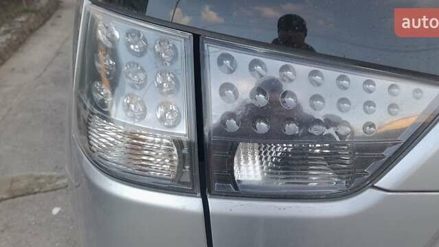 Сірий Міцубісі Аутлендер, об'ємом двигуна 1.97 л та пробігом 197 тис. км за 8999 $, фото 11 на Automoto.ua