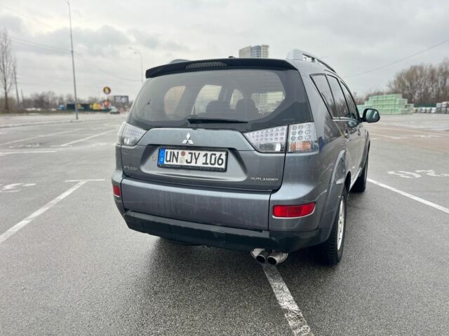 Серый Мицубиси Аутлендер, объемом двигателя 2 л и пробегом 235 тыс. км за 4800 $, фото 10 на Automoto.ua