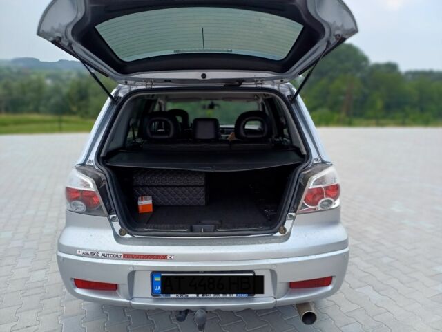 Серый Мицубиси Аутлендер, объемом двигателя 2.4 л и пробегом 243 тыс. км за 6200 $, фото 7 на Automoto.ua