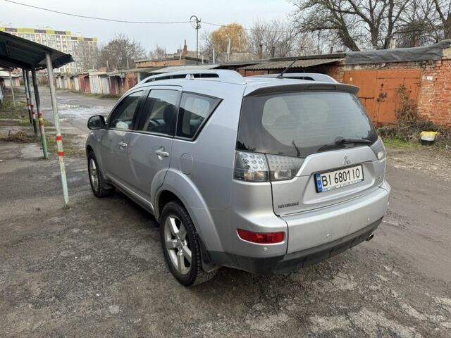 Серый Мицубиси Аутлендер, объемом двигателя 2.4 л и пробегом 330 тыс. км за 9000 $, фото 7 на Automoto.ua