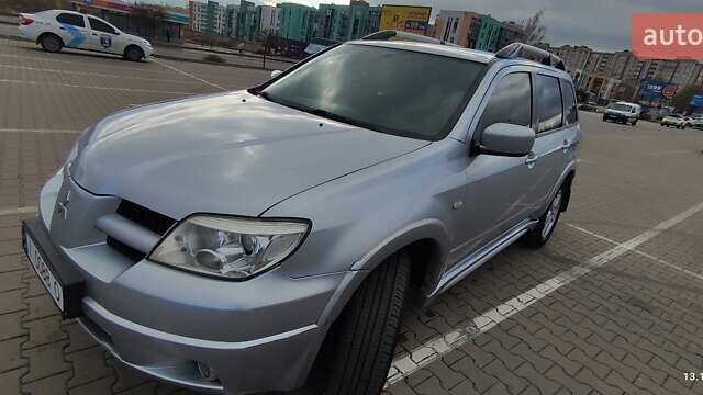 Сірий Міцубісі Аутлендер, об'ємом двигуна 2.4 л та пробігом 170 тис. км за 6400 $, фото 19 на Automoto.ua