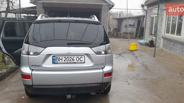 Сірий Міцубісі Аутлендер, об'ємом двигуна 1.97 л та пробігом 197 тис. км за 8999 $, фото 1 на Automoto.ua