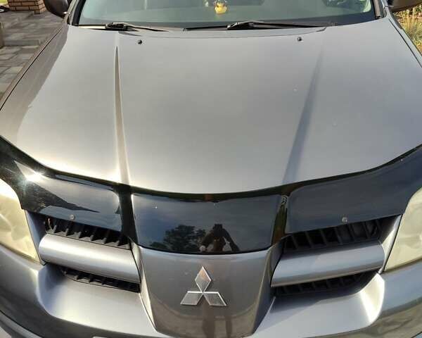 Серый Мицубиси Аутлендер, объемом двигателя 2.4 л и пробегом 23 тыс. км за 8300 $, фото 20 на Automoto.ua