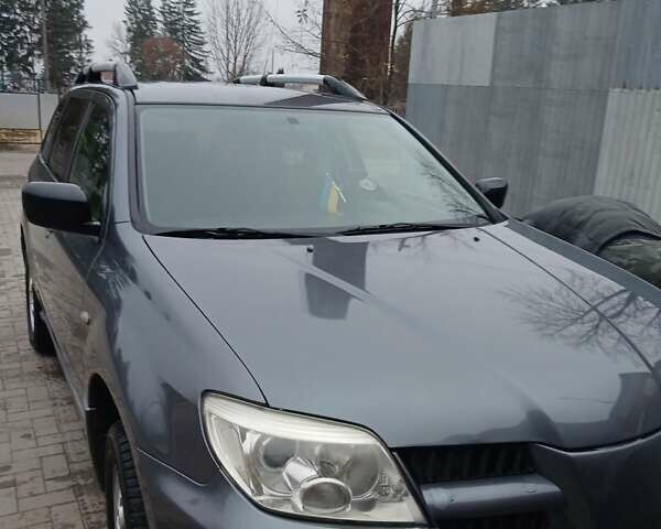 Сірий Міцубісі Аутлендер, об'ємом двигуна 2 л та пробігом 191 тис. км за 6500 $, фото 3 на Automoto.ua