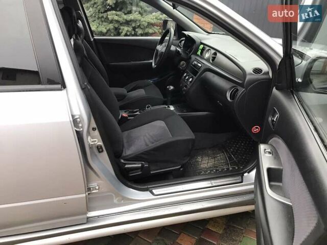 Сірий Міцубісі Аутлендер, об'ємом двигуна 2.4 л та пробігом 167 тис. км за 6400 $, фото 8 на Automoto.ua