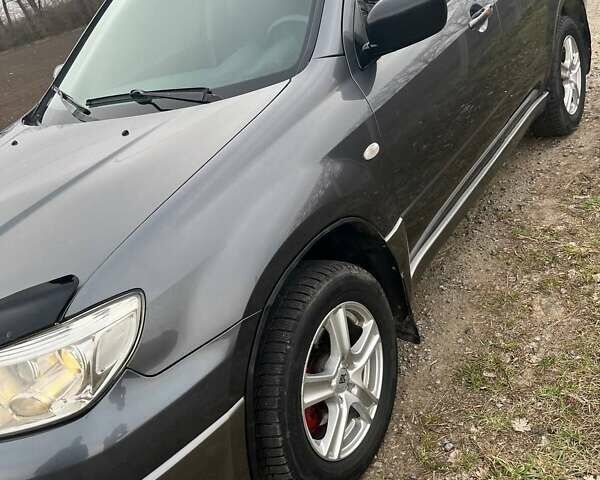 Сірий Міцубісі Аутлендер, об'ємом двигуна 2 л та пробігом 280 тис. км за 7200 $, фото 5 на Automoto.ua