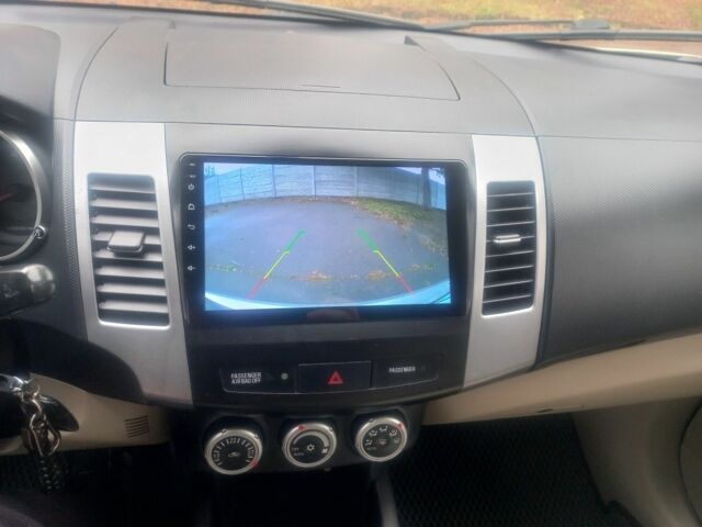 Сірий Міцубісі Аутлендер, об'ємом двигуна 2 л та пробігом 245 тис. км за 8600 $, фото 7 на Automoto.ua