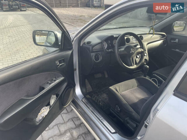 Сірий Міцубісі Аутлендер, об'ємом двигуна 2.4 л та пробігом 166 тис. км за 6700 $, фото 11 на Automoto.ua