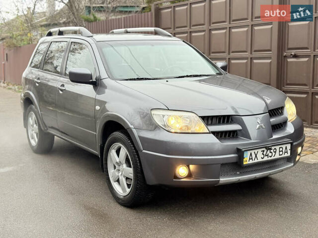 Серый Мицубиси Аутлендер, объемом двигателя 2.4 л и пробегом 240 тыс. км за 6900 $, фото 53 на Automoto.ua