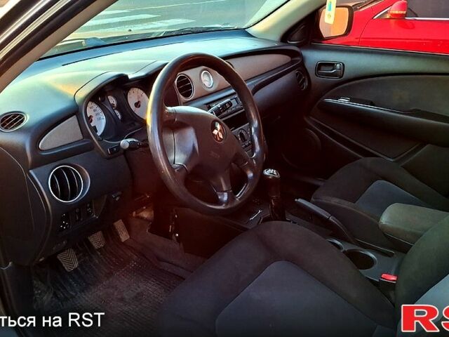 Сірий Міцубісі Аутлендер, об'ємом двигуна 2.4 л та пробігом 211 тис. км за 5000 $, фото 4 на Automoto.ua