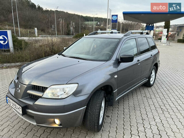 Серый Мицубиси Аутлендер, объемом двигателя 2 л и пробегом 196 тыс. км за 6450 $, фото 28 на Automoto.ua