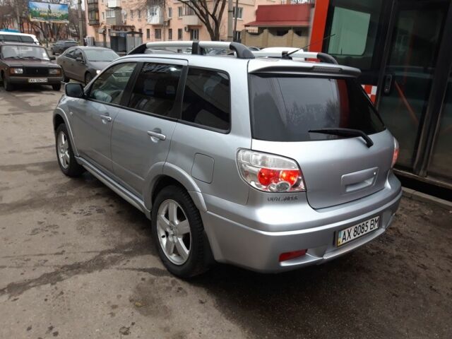 Сірий Міцубісі Аутлендер, об'ємом двигуна 2.4 л та пробігом 190 тис. км за 6000 $, фото 1 на Automoto.ua