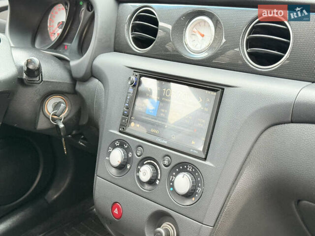 Серый Мицубиси Аутлендер, объемом двигателя 2.4 л и пробегом 240 тыс. км за 6900 $, фото 33 на Automoto.ua