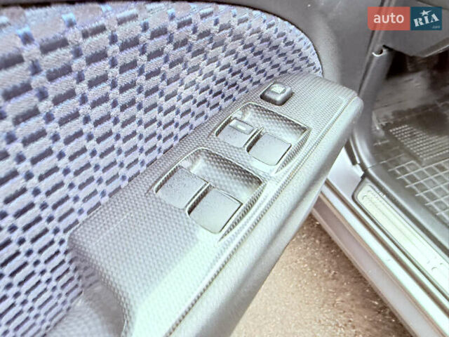 Серый Мицубиси Аутлендер, объемом двигателя 2.4 л и пробегом 240 тыс. км за 6900 $, фото 35 на Automoto.ua