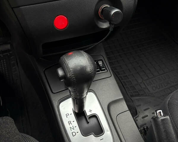 Серый Мицубиси Аутлендер, объемом двигателя 2.38 л и пробегом 238 тыс. км за 7450 $, фото 22 на Automoto.ua