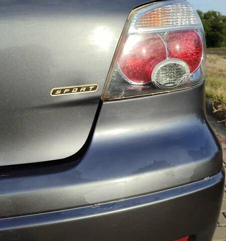 Серый Мицубиси Аутлендер, объемом двигателя 2.38 л и пробегом 189 тыс. км за 7600 $, фото 4 на Automoto.ua