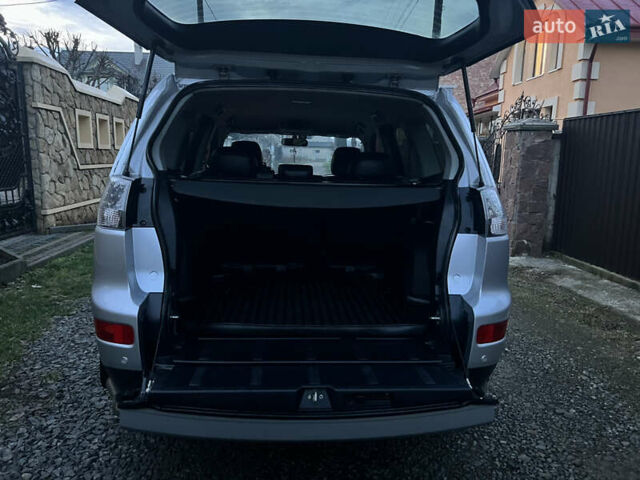 Серый Мицубиси Аутлендер, объемом двигателя 2.4 л и пробегом 236 тыс. км за 7600 $, фото 24 на Automoto.ua