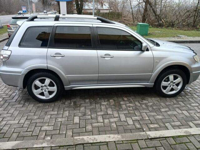 Серый Мицубиси Аутлендер, объемом двигателя 2.4 л и пробегом 300 тыс. км за 5900 $, фото 8 на Automoto.ua