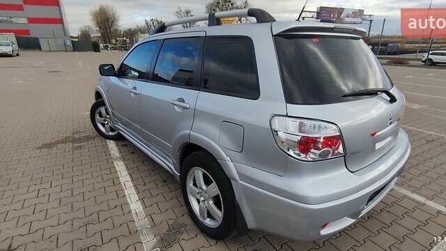 Сірий Міцубісі Аутлендер, об'ємом двигуна 2.4 л та пробігом 170 тис. км за 6400 $, фото 21 на Automoto.ua