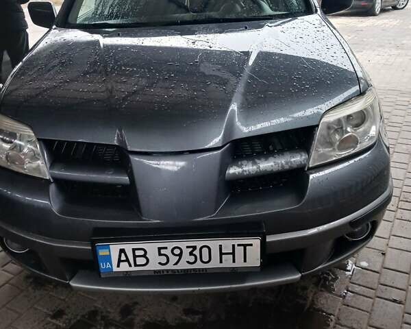 Сірий Міцубісі Аутлендер, об'ємом двигуна 2 л та пробігом 191 тис. км за 6500 $, фото 14 на Automoto.ua