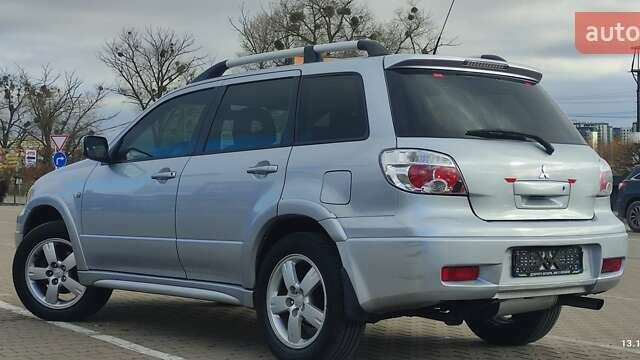 Сірий Міцубісі Аутлендер, об'ємом двигуна 2.4 л та пробігом 170 тис. км за 6400 $, фото 4 на Automoto.ua