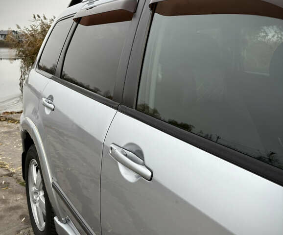 Серый Мицубиси Аутлендер, объемом двигателя 2.38 л и пробегом 238 тыс. км за 7450 $, фото 15 на Automoto.ua