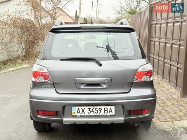 Серый Мицубиси Аутлендер, объемом двигателя 2.4 л и пробегом 240 тыс. км за 6900 $, фото 9 на Automoto.ua