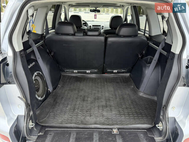 Серый Мицубиси Аутлендер, объемом двигателя 2 л и пробегом 299 тыс. км за 7750 $, фото 36 на Automoto.ua