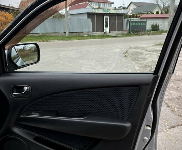 Серый Мицубиси Аутлендер, объемом двигателя 2.38 л и пробегом 238 тыс. км за 7450 $, фото 34 на Automoto.ua