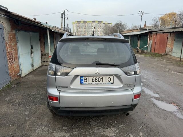 Серый Мицубиси Аутлендер, объемом двигателя 2.4 л и пробегом 330 тыс. км за 9000 $, фото 6 на Automoto.ua