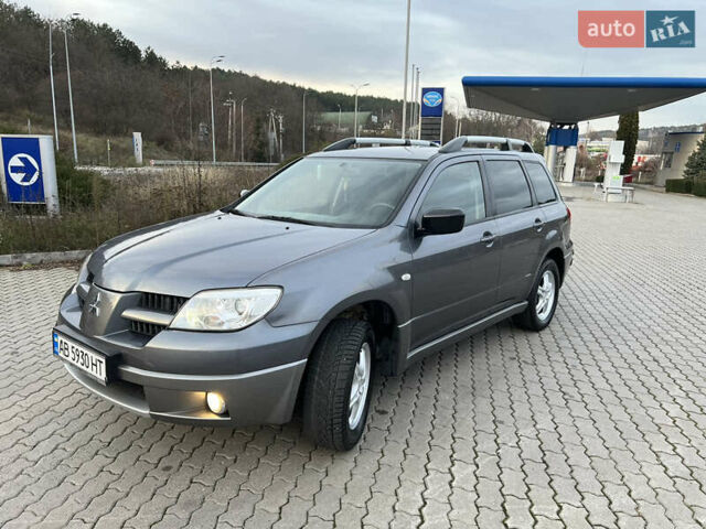 Серый Мицубиси Аутлендер, объемом двигателя 2 л и пробегом 196 тыс. км за 6450 $, фото 17 на Automoto.ua