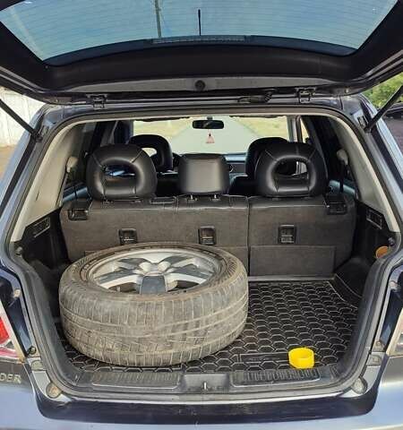 Серый Мицубиси Аутлендер, объемом двигателя 2.38 л и пробегом 189 тыс. км за 7600 $, фото 13 на Automoto.ua