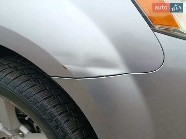 Серый Мицубиси Аутлендер, объемом двигателя 2 л и пробегом 332 тыс. км за 7650 $, фото 35 на Automoto.ua