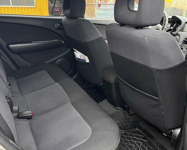 Сірий Міцубісі Аутлендер, об'ємом двигуна 2 л та пробігом 332 тис. км за 6200 $, фото 14 на Automoto.ua