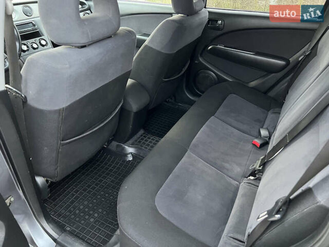 Серый Мицубиси Аутлендер, объемом двигателя 2 л и пробегом 196 тыс. км за 6450 $, фото 29 на Automoto.ua