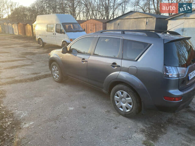 Серый Мицубиси Аутлендер, объемом двигателя 1.97 л и пробегом 257 тыс. км за 9000 $, фото 9 на Automoto.ua