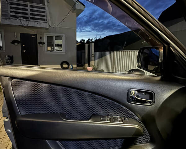 Серый Мицубиси Аутлендер, объемом двигателя 2.38 л и пробегом 238 тыс. км за 7450 $, фото 55 на Automoto.ua