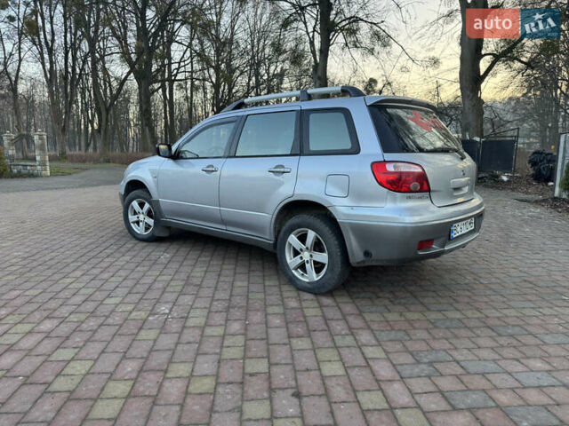 Серый Мицубиси Аутлендер, объемом двигателя 2 л и пробегом 415 тыс. км за 4699 $, фото 1 на Automoto.ua