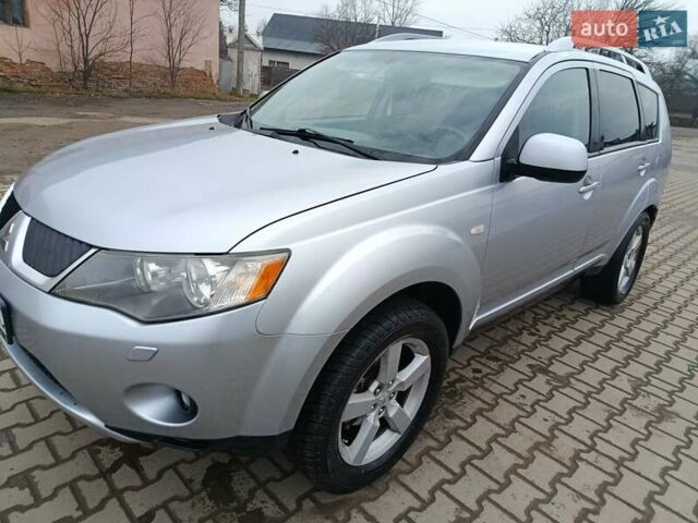 Серый Мицубиси Аутлендер, объемом двигателя 2 л и пробегом 332 тыс. км за 7650 $, фото 4 на Automoto.ua