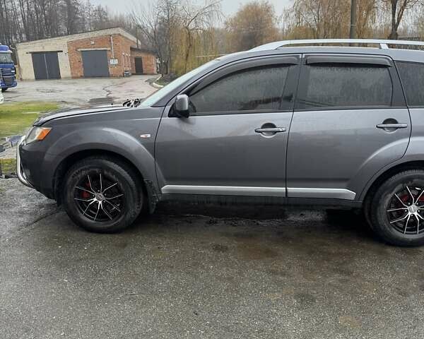 Серый Мицубиси Аутлендер, объемом двигателя 2 л и пробегом 260 тыс. км за 8400 $, фото 8 на Automoto.ua