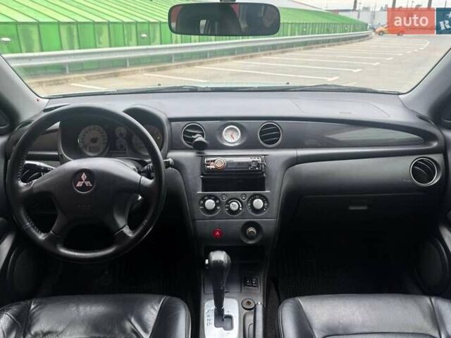 Серый Мицубиси Аутлендер, объемом двигателя 2.4 л и пробегом 245 тыс. км за 6790 $, фото 12 на Automoto.ua