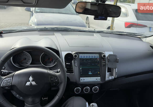 Серый Мицубиси Аутлендер, объемом двигателя 1.97 л и пробегом 260 тыс. км за 10900 $, фото 17 на Automoto.ua