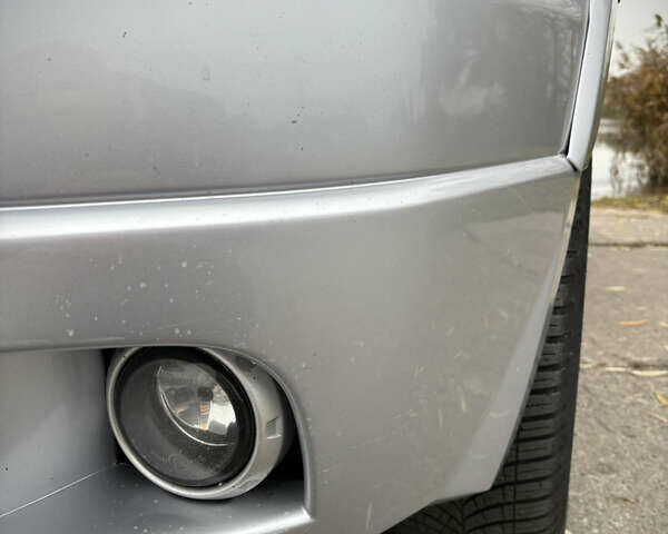 Серый Мицубиси Аутлендер, объемом двигателя 2.38 л и пробегом 238 тыс. км за 7450 $, фото 12 на Automoto.ua